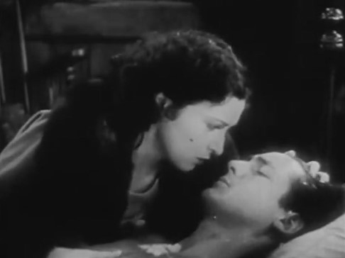 John Allen casi congelado por el temporal de nieve consolado por Rosalee.