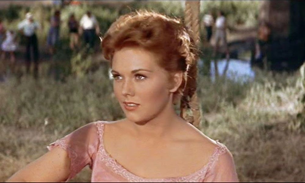 PICNIC (1955) de Joshua Logan 3 Madge (Kim Novak) muy dulce vestida de rosa en Picnic. Joshua Logan. estrellamillansanjuan.es
