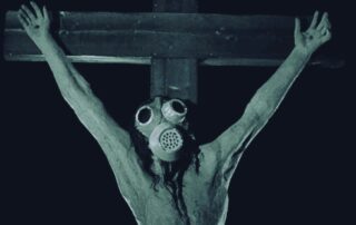 LAS RUINAS DE UN IMPERIO (Oblomok imperii, 1929). Fridrikh Ermler 13 Cristo crucificado con máscara de gas. Las ruinas de un imperio. Oblomok imperii.